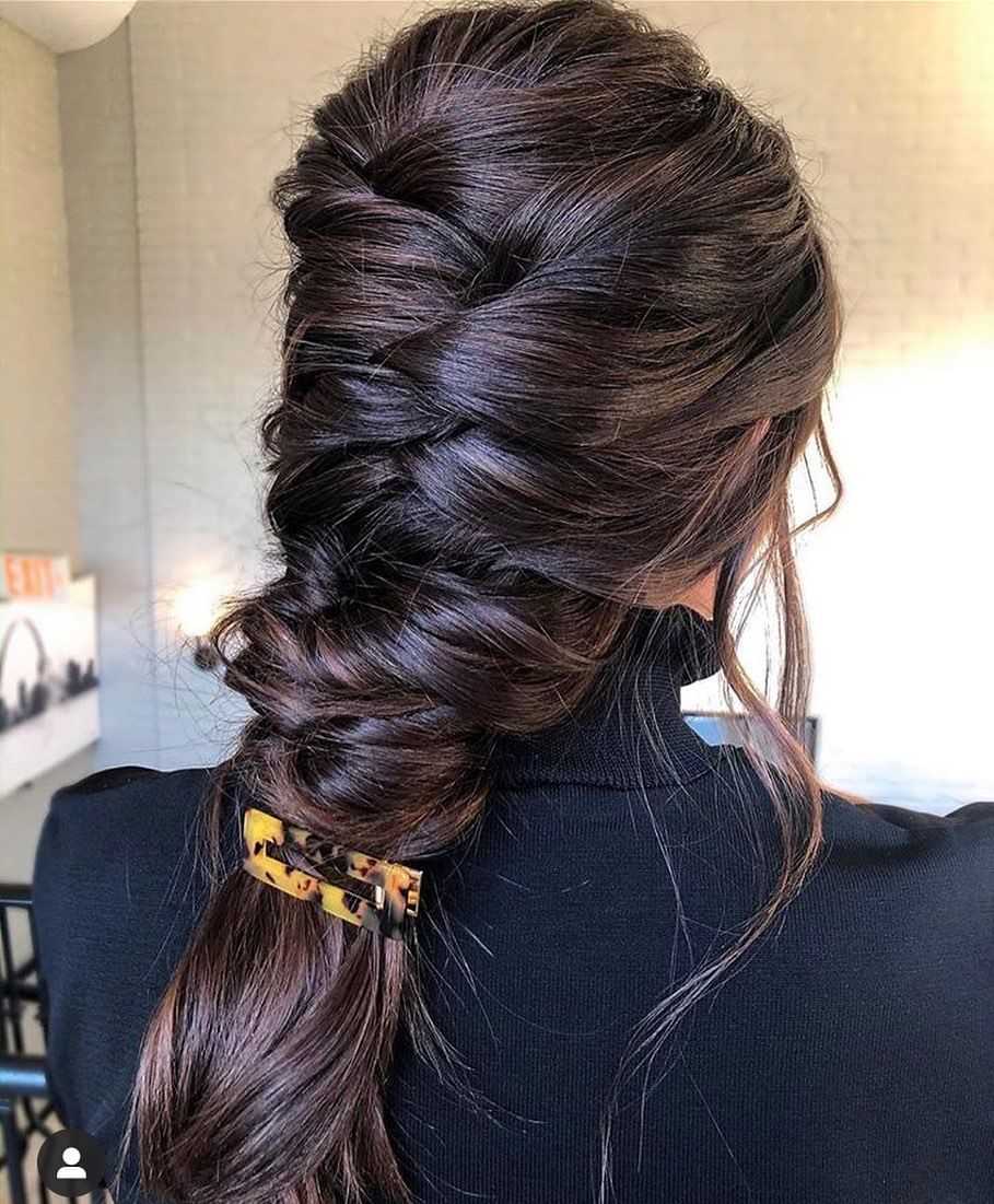 Elegant brunette braid hairstyle with tortoiseshell hair clip.